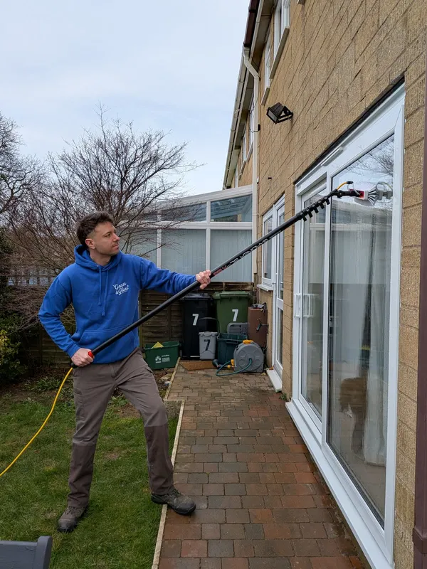 Water-fed pole window cleaning in action
